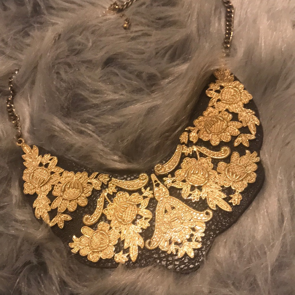 Gold on leather necklace